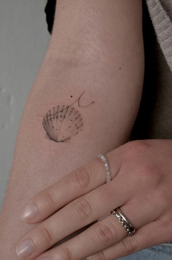 Bouquet of stems on the inner forearm