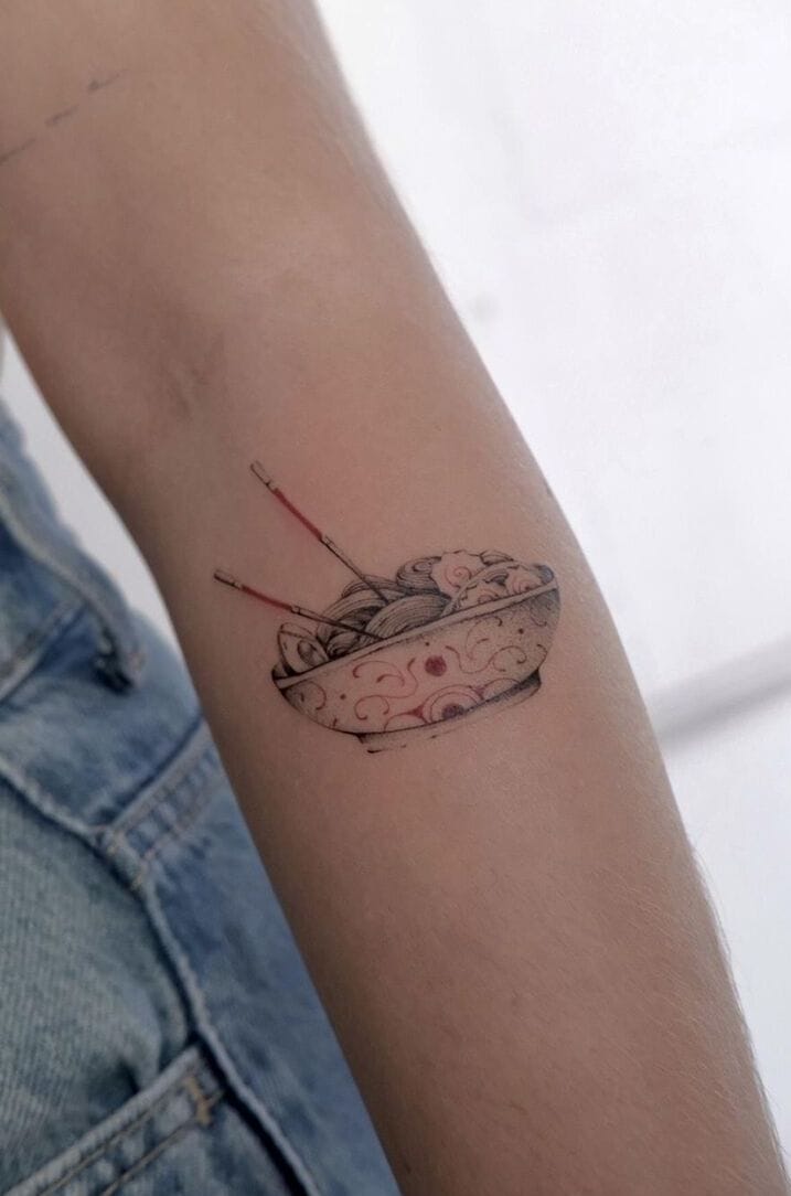 Micro-realist noodle bowl on the arm